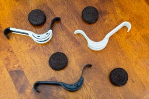 A table with cookies and spoons on it