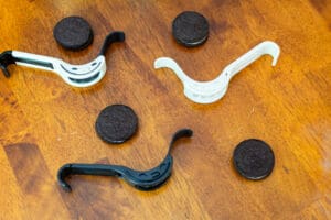 A table with cookies and cookie cutters on it