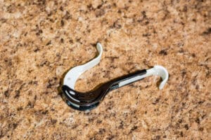 A black and white hook on the floor